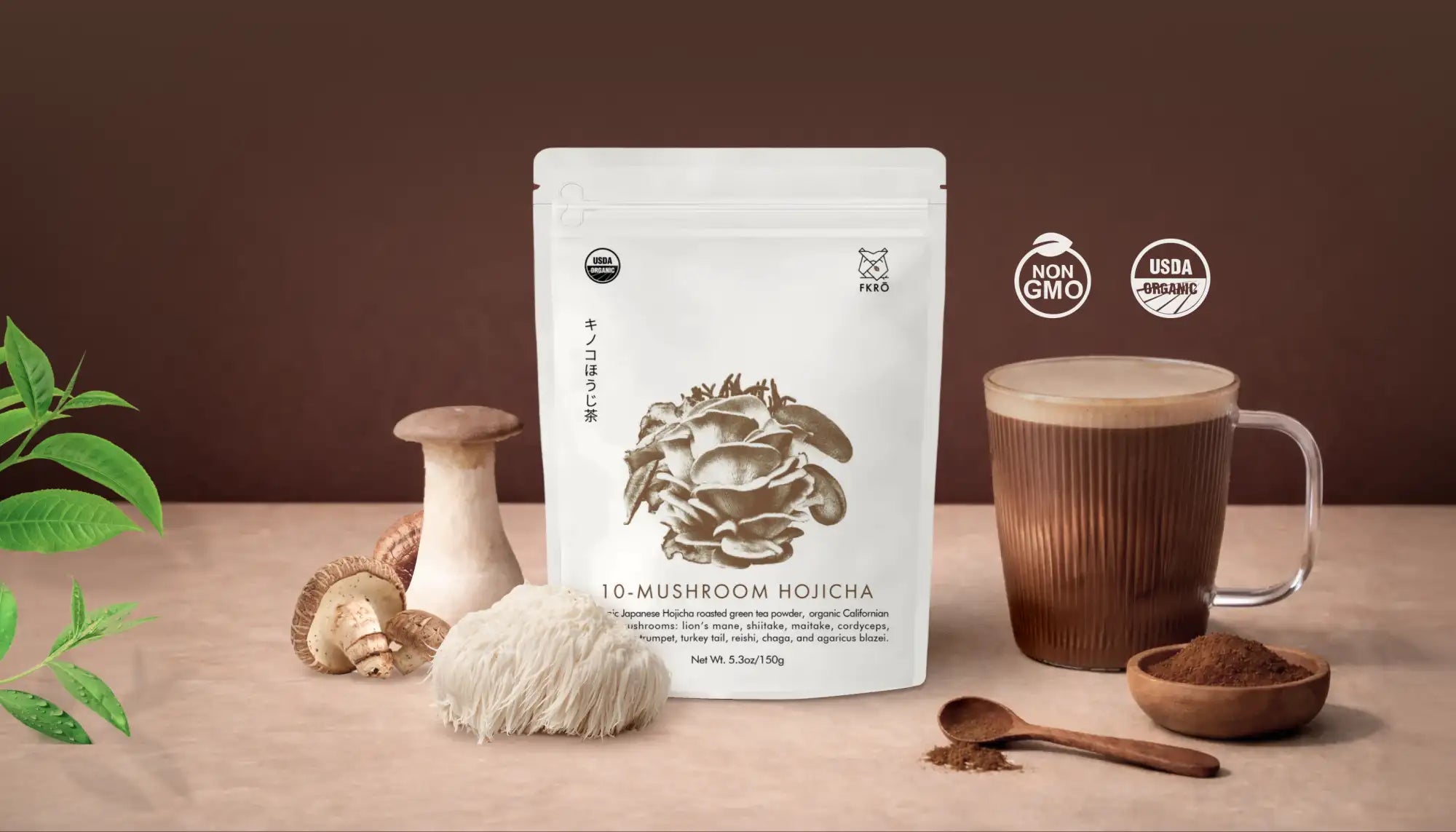 White pouch of 10-mushroom hojicha tea powder with a minimalist design featuring an illustration of mushrooms and certification logos.